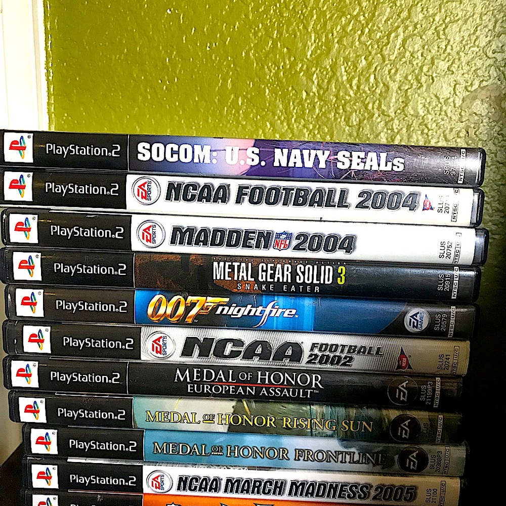 Stack of classic PS2 games.